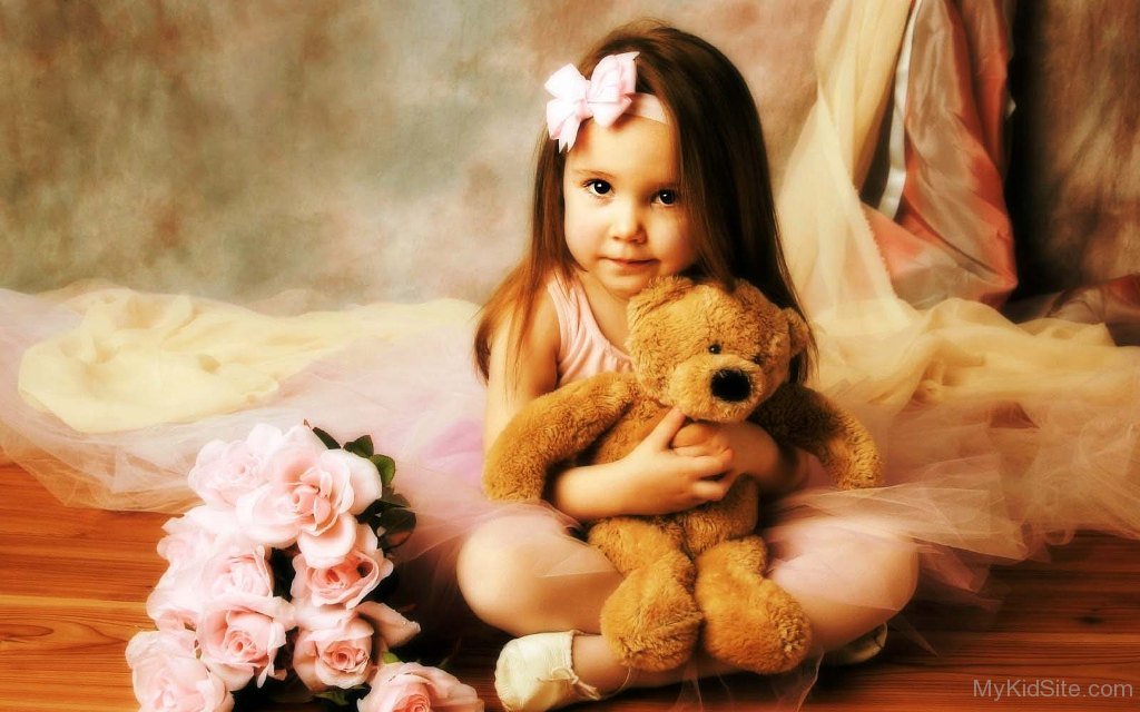 cute girl with teddy