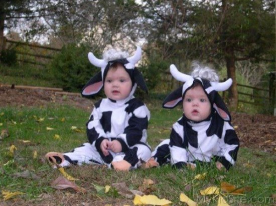 Babies In Cow Dress