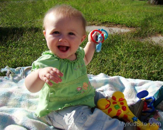 Baby Fun In Garden