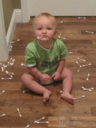 Baby Boy Playing With Buds