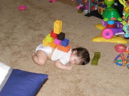 Baby Sleeping With Building Blocks