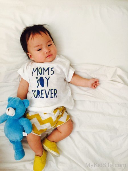 Baby Laying With Teddy