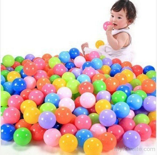 Baby Playing With Balls