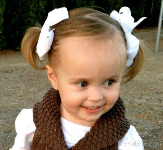 Cute Baby Wearing White Ribbon