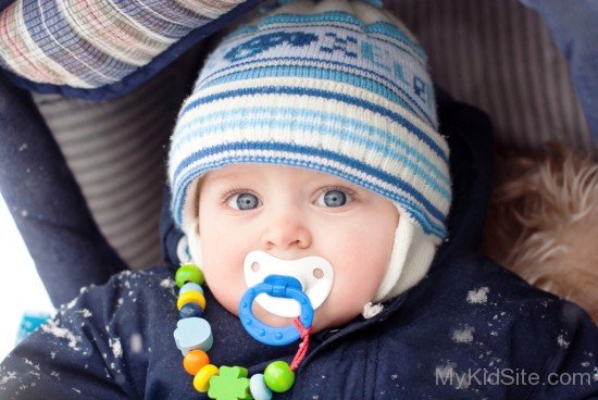 Baby Boy In Snowfall