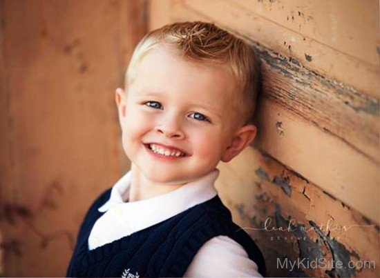 Boy In Blue Sweater